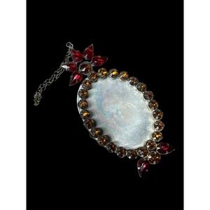 Oval picture frame with Red and Amber Glass Rhinestones Antique